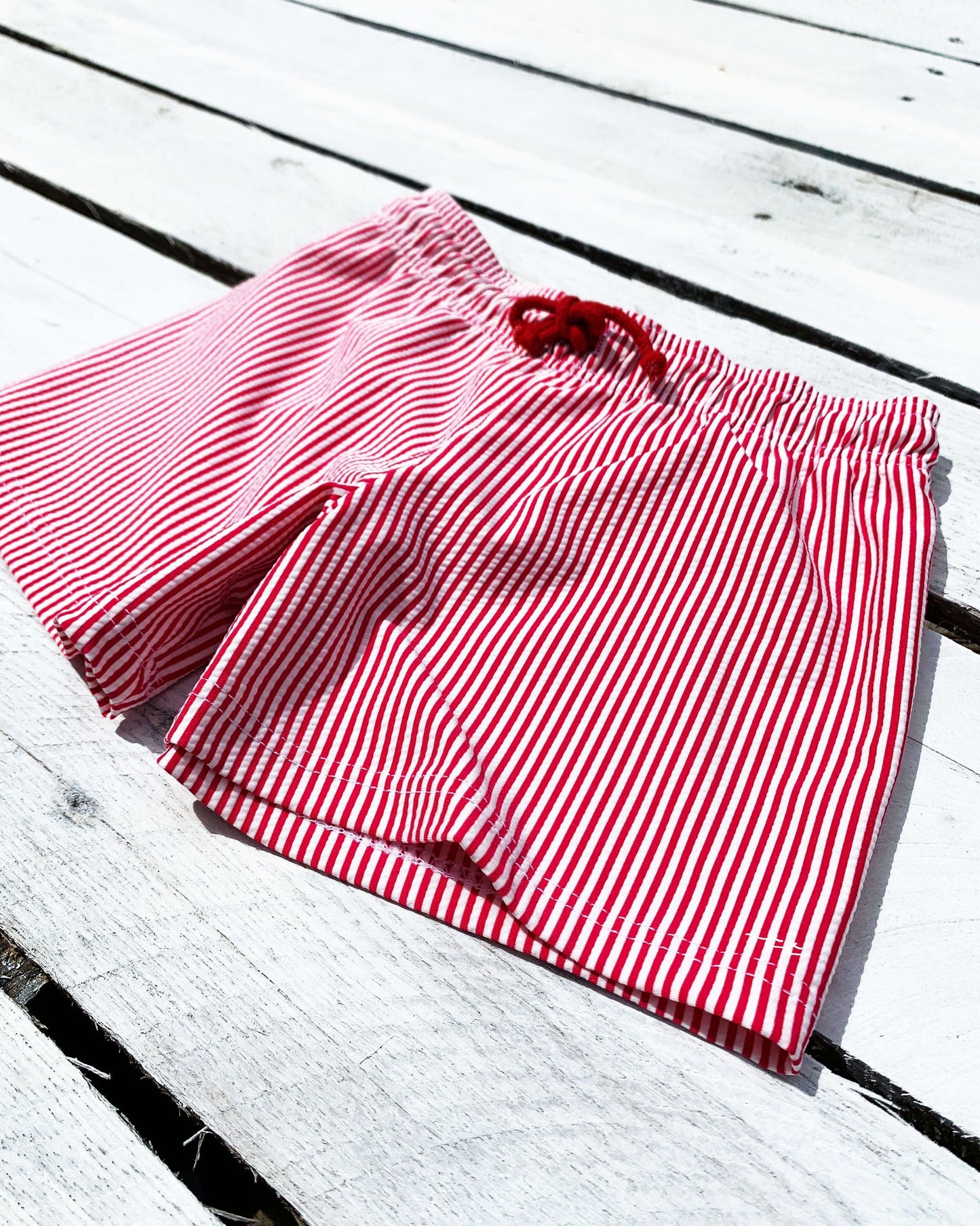 Cute toddler and children's swimwear. Matching sibling swim suit collections. UPF 50 Fabric. Made in the USA!