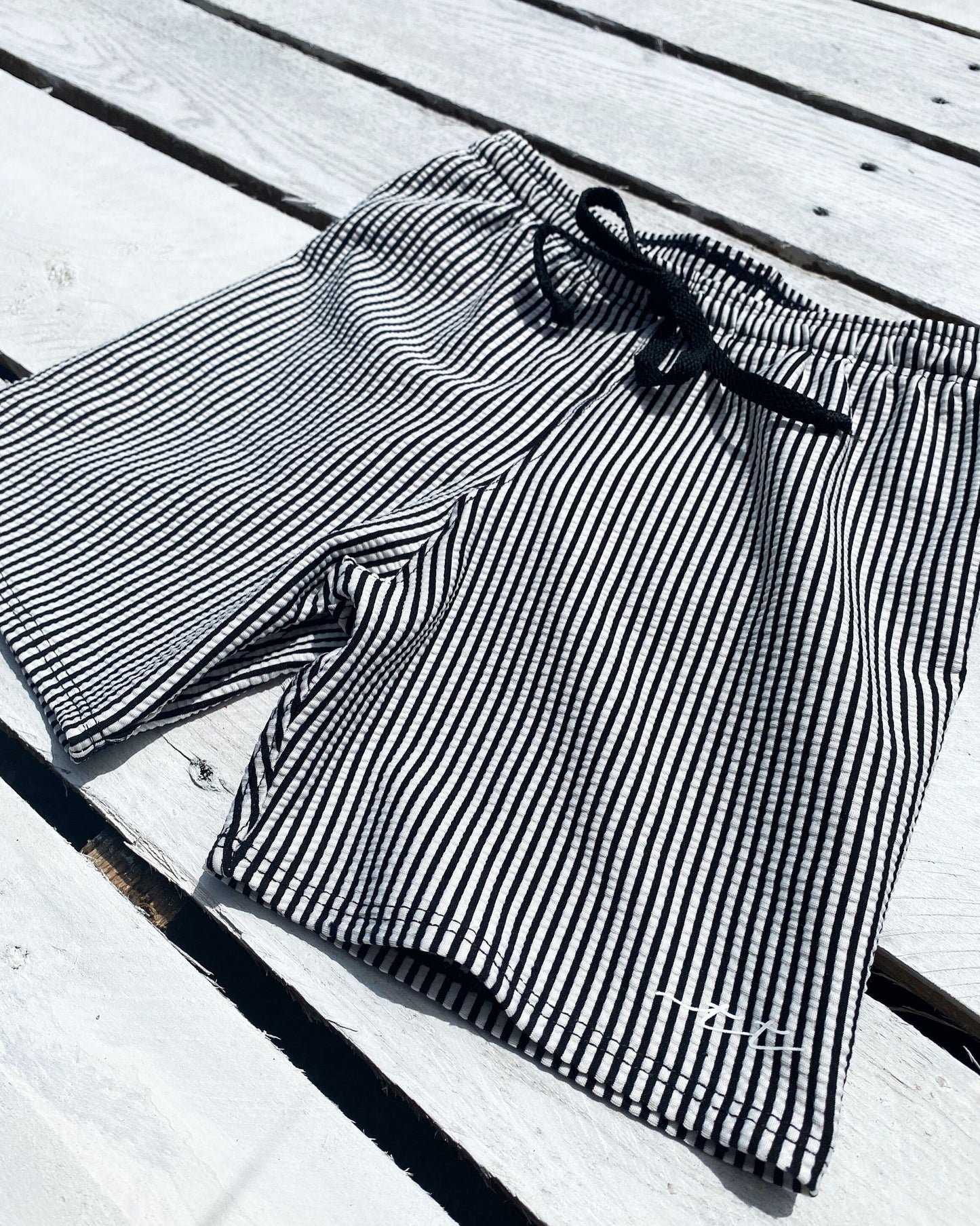 Cute toddler and children's swimwear. Matching sibling swim suit collections. UPF 50 Fabric. Made in the USA!