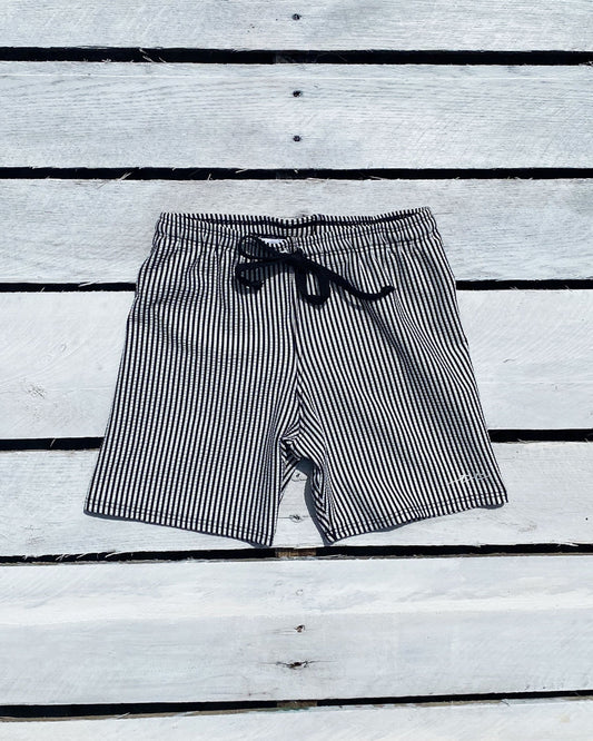 Cute toddler and children's swimwear. Matching sibling swim suit collections. UPF 50 Fabric. Made in the USA!