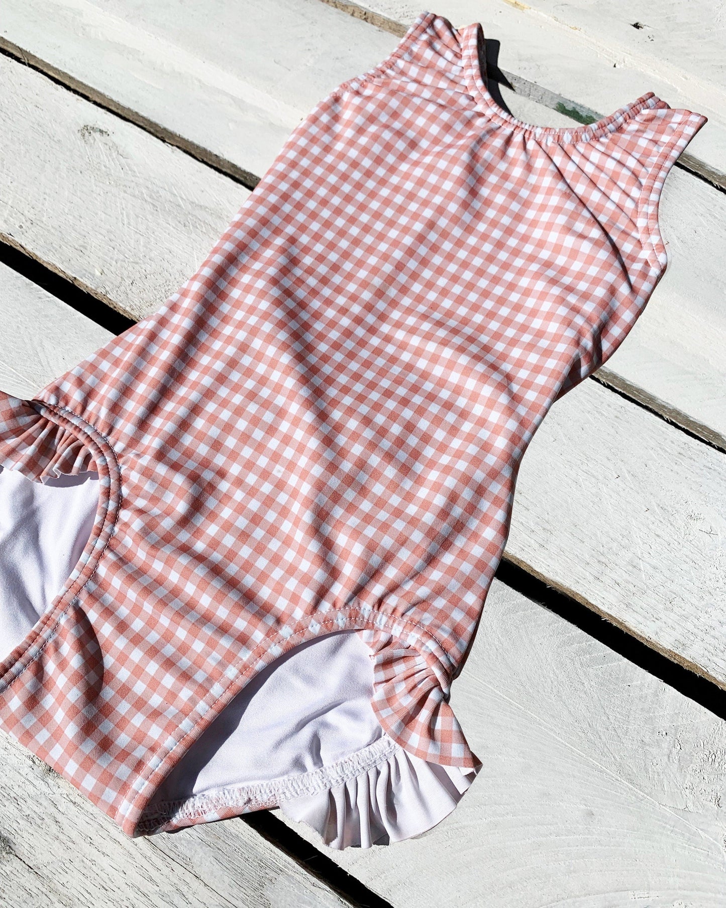 Cute toddler and children's swimwear. Matching sibling swim suit collections. UPF 50 Fabric. Made in the USA!