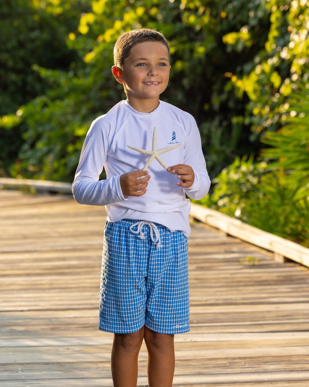 Cute toddler and children's swimwear. Matching sibling swim suit collections. UPF 50 Fabric. Made in the USA!