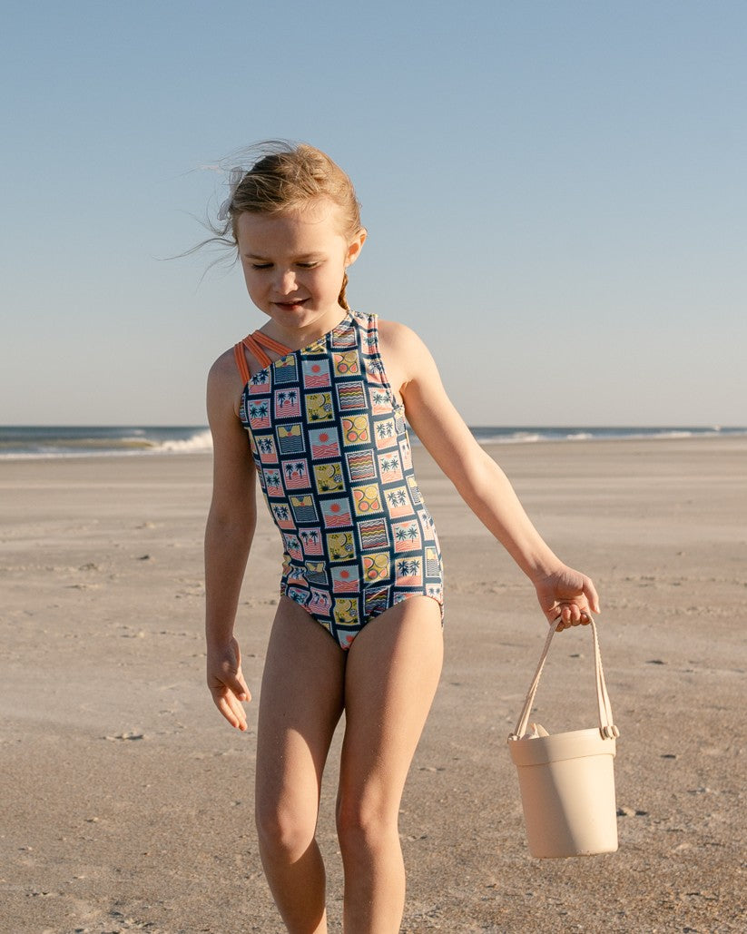 Coastal Stamps Girl Asymmetric Strappy One Piece