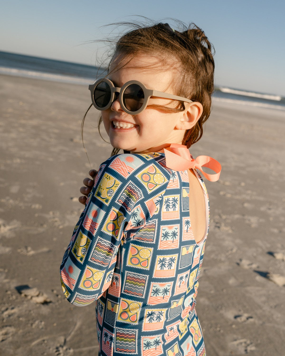 Coastal Stamps Girl Long Sleeve One Piece with Ribbon