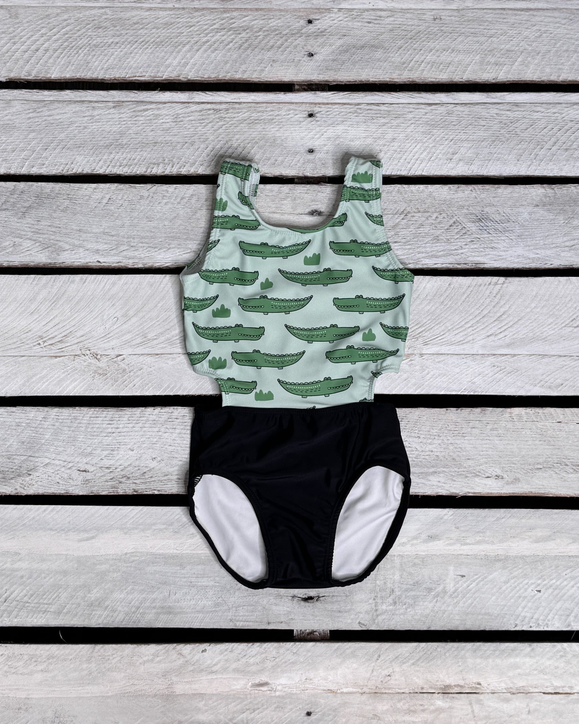 Cute toddler and children's swimwear. Matching sibling swim suit collections. UPF 50 Fabric. Made in the USA!