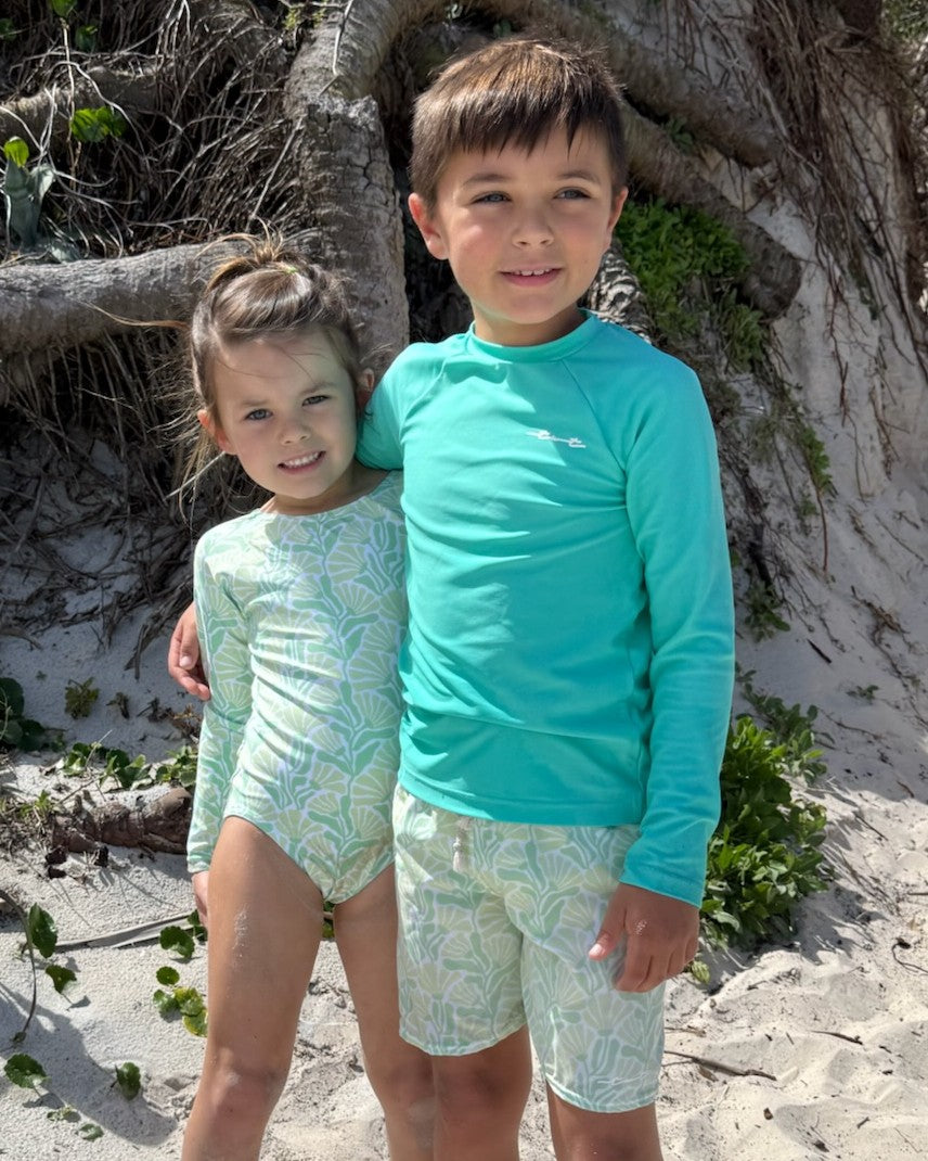 Cute toddler and children's swimwear. Matching sibling swim suit collections. UPF 50 Fabric. Made in the USA!