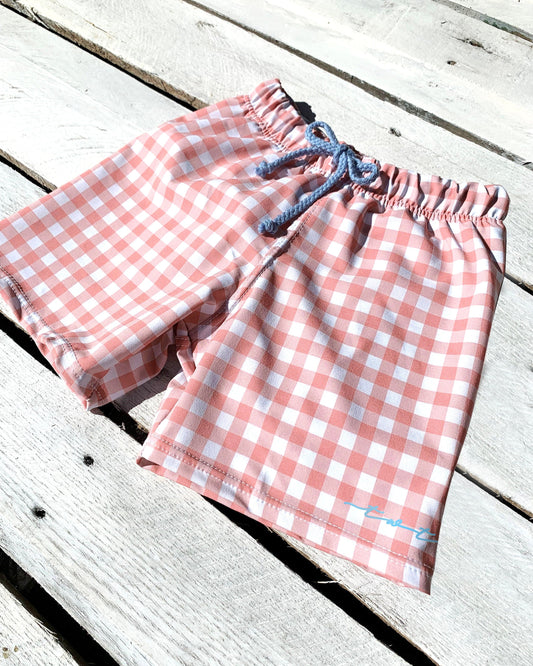Cute toddler and children's swimwear. Matching sibling swim suit collections. UPF 50 Fabric. Made in the USA!